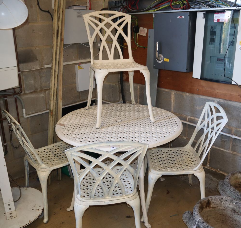 A circular painted metal garden table and four chairs, table 110cm diameter, H.74cm
